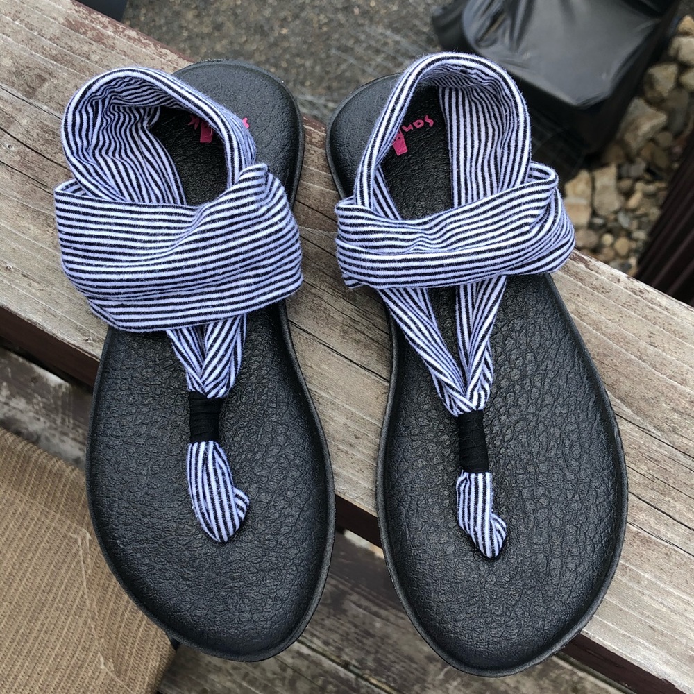 black and white striped children’s sanuk sandals